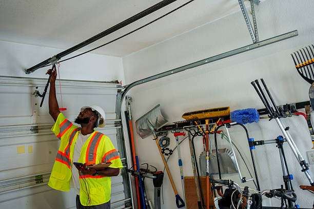 Professional Garage Door Panel Replacement technician working in Gananda, NY